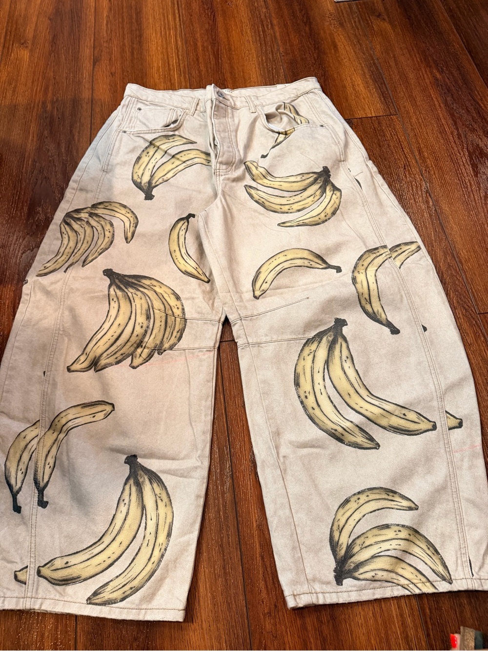 We The Free Beige Wide-Leg Jeans with Banana Print